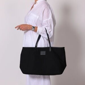 Brand new canvas tote. 
I have two. With tags. Not used.